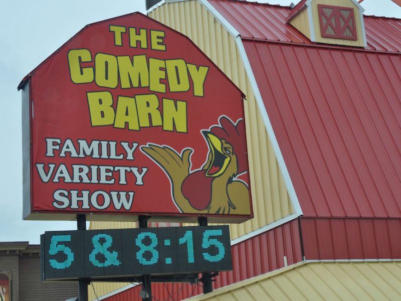 The Comedy Barn Theater sign
