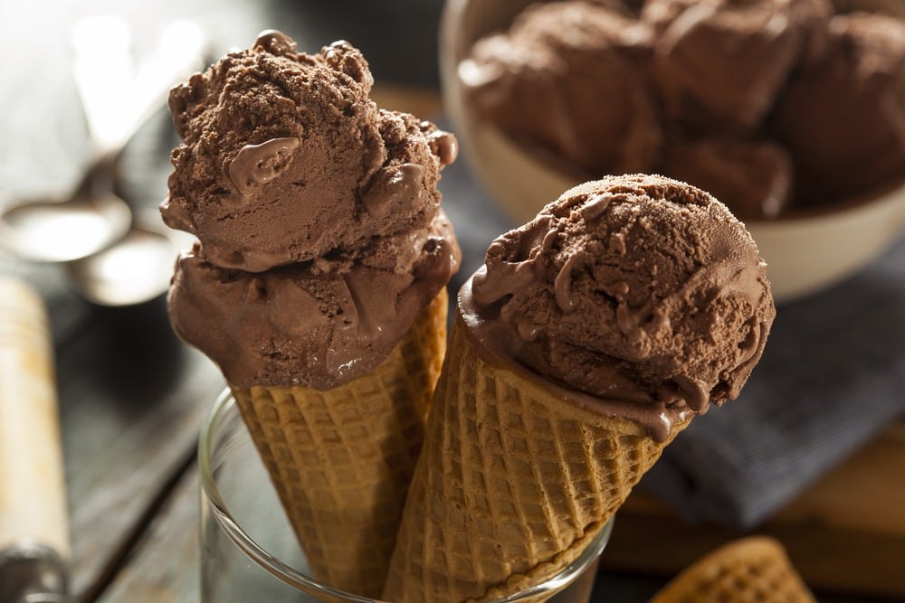 Two chocolate ice cream cones.