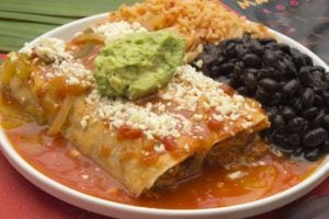 Delicious enchiladas with black beans and rice.