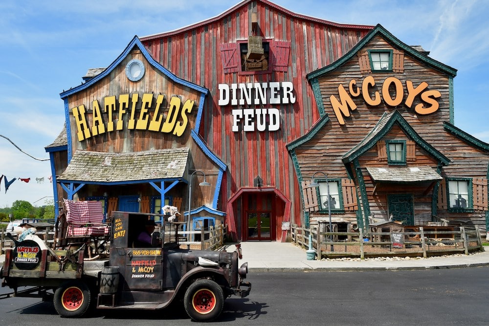 Hatfield and McCoy's sign with truck out front