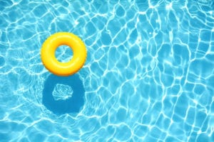 yellow inner tube in a pool