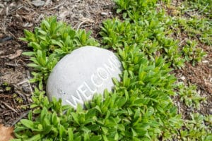 garden stone with the word welcome engraved